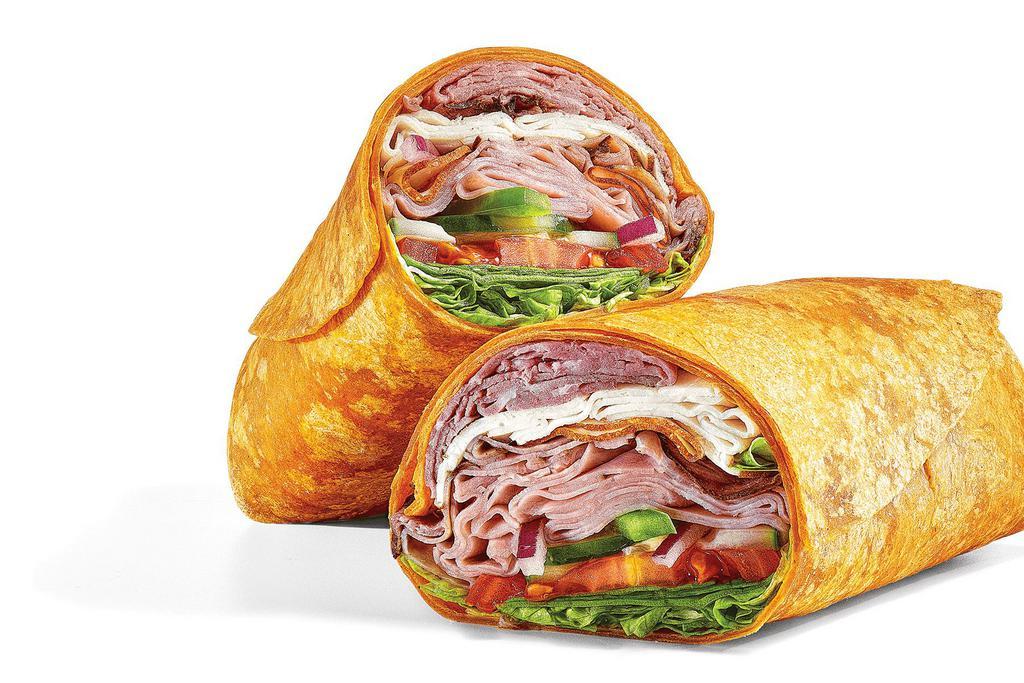 Subway Club® (530 Cals) · Because you don’t need bread to make a good Club: Oven-Roasted Turkey, Black Forest Ham, Choice Angus Roast Beef, and veggies — all folded up in a Tomato Basil Wrap.