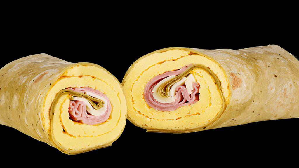 Black Forest Ham, Egg & Cheese Wrap (770 Cals) · Helllooo delicious! Enjoy a Spinach wrap filled with American cheese and a double portion of savory Black Forest ham and egg. What a tasty way to start the day!
