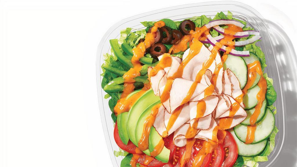 Baja Turkey With Sliced Avocado (290 Cals) · Spice up your salad with Oven-Roasted Turkey, and Sliced Avocado, on a bed of greens and crisp veggies and topped with Baja Chipotle sauce.