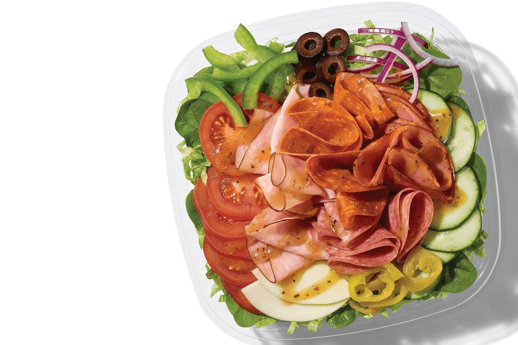Supreme Meats (300 Cals) · Side salad? More like front and center supreme salad. This one is packed with mouth-watering meats. We’re talking NEW Italian-style capicola, thin-sliced Black Forest Ham, Genoa Salami, and pepperoni set on top of a bed of lettuce, spinach, tomatoes, cucumbers, green peppers, black olives, red onions, banana peppers with provolone, and topped off with our famous MVP Parmesan Vinaigrette™.