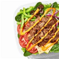  Baja Steak & Jack (350 Cals) · This is no “side salad”: it’s the main course. Steak and Pepper Jack Cheese are piled on fre...
