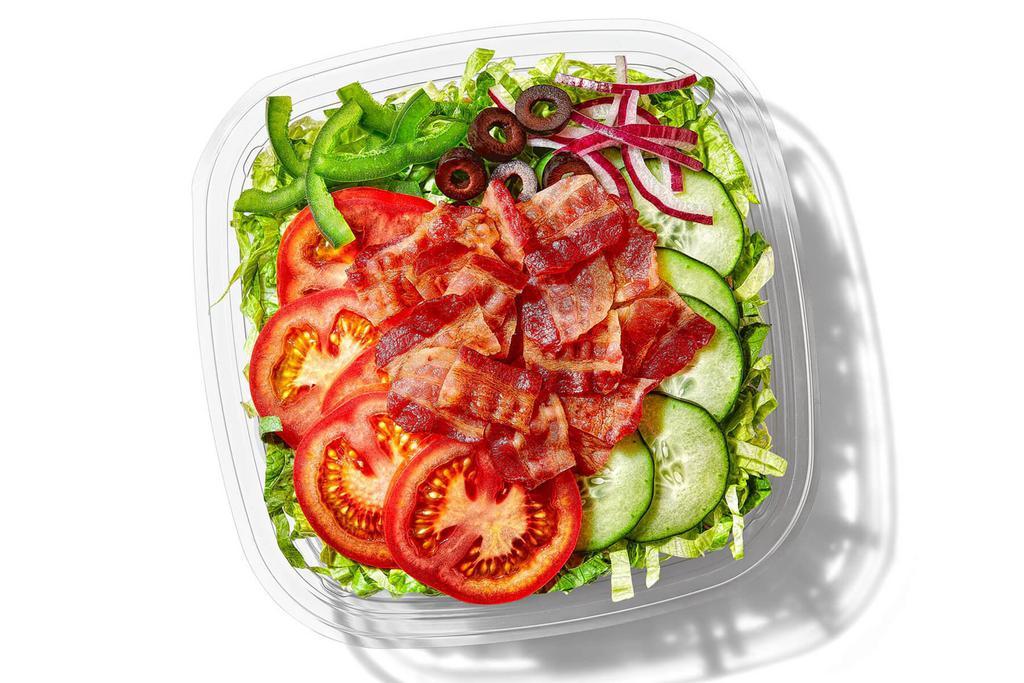 L.T. (210 Cals) · Savory hickory smoked bacon. Crisp lettuce. Ripe tomatoes. All mixed with Spinach, crunchy cucumbers, sweet green peppers, black olives, and zesty red onions.