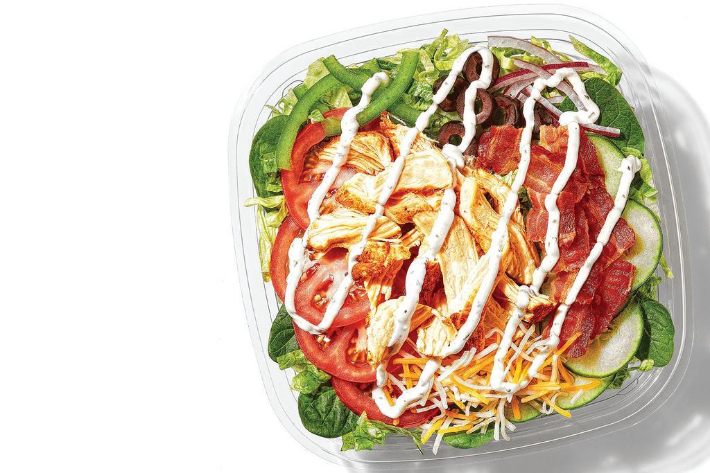 Chicken & Bacon Ranch (490 Cals) · Rotisserie-Style Chicken, Monterey Cheddar Cheese, and Hickory-Smoked Bacon, all on a bowl of greens and topped with Peppercorn Ranch. Because sometimes a garden salad won’t do.