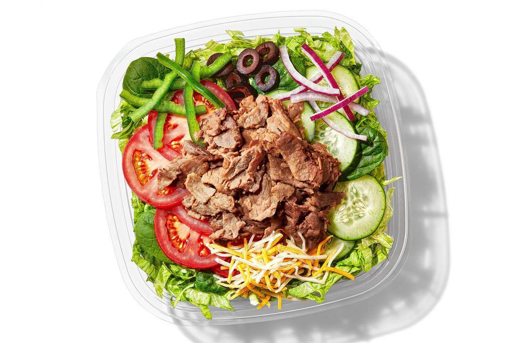 Steak & Cheese (210 Cals) · The Steak & Cheese salad starts with crisp greens, but gets to the next level with warm, delicious steak topped with cheese. Dreams do come true.
