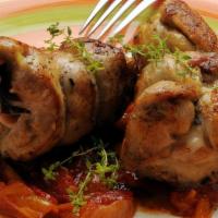 Petto Di Pollo Saltimbocca · Chicken breast, prosciutto, tre-funghi.