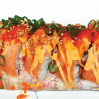 45. Lion King · California Roll topped with Baked Salmon, Tobiko, Onion & Sauce