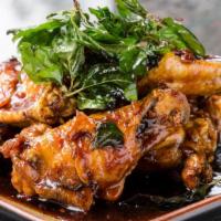 #8 Angel Wings · Crispy wings sautéed with house special sauce.