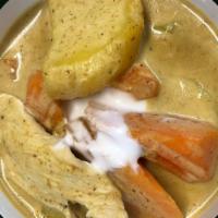 #41 Yellow Curry · A mild curry with chicken, prawns, or mix veggies, turmeric fresh herbs, spices, coconut mil...
