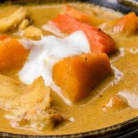 #42 Kabocha Squash Curry · Kabocha squash simmered with mild yellow curry, tofu, and coconut milk, with chicken or praw...