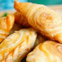Thai Samosa · Vegetarian fried  pastry (4) filling with savory spiced potato, carrot, and onion. Served wi...