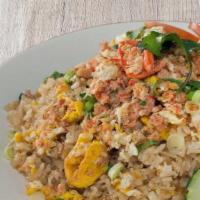 Crab Fried Rice · Delicious fried rice with real crab claw meat, egg and green onion.