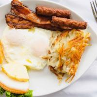 Martin's Breakfast · Two eggs , two bacon strips, two sausage links , martin's house made cinnamon roll and hash ...
