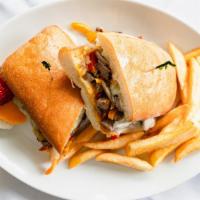 Philly Cheese Steak · NY strip steak, sautéed bell pepper , onion, and cheese try it martin style for additional c...