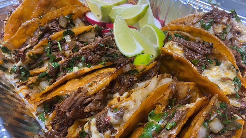 BIRRIA FAMILY PACK  · 12 BIRRIA TACOS WHIT CHEESSE, 4 CONSOME , ONION AND CILANTRO