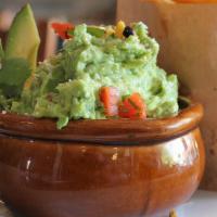 GUACAMOLE AND CHIPS · Fresh guacamole with pico, cotija and tortilla chips.