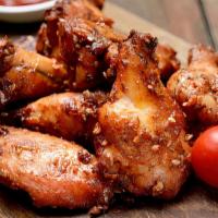 BBQ Chicken Wings with Fries · Sweet BBQ flavored chicken wings.