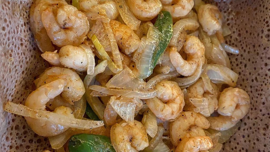 Shrimp Tibs · Fresh shrimp sautéed with fresh onions and jalapeño mixed with little bit of mitmita.