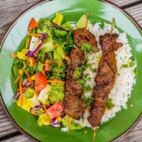 Beef Shish Kebab · Grilled tender beef chunks treated with house-made seasoning threaded on skewer. Served with...