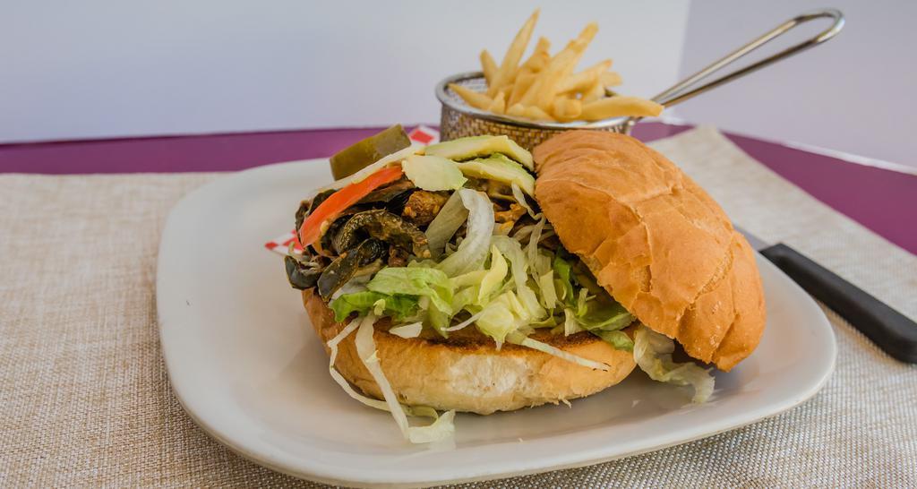 Regular Torta · Choice of meat, lettuce, tomatoes, onions, avocado, and mayonnaise.