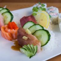 Tri Color Sashimi Deluxe · Total 12 pcs tuna, yellowtail, salmon w/ rainbow roll or dragon roll.