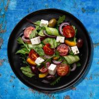 Greek Gusto Salad · Fresh romaine lettuce, feta cheese, cucumbers, tomatoes, and olives.