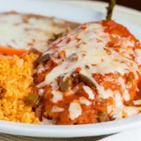 Chile Rellenos Dinner Entree · Served with rice and beans.  Stuffed with cheese, dipped in our homemade egg batter and ligh...