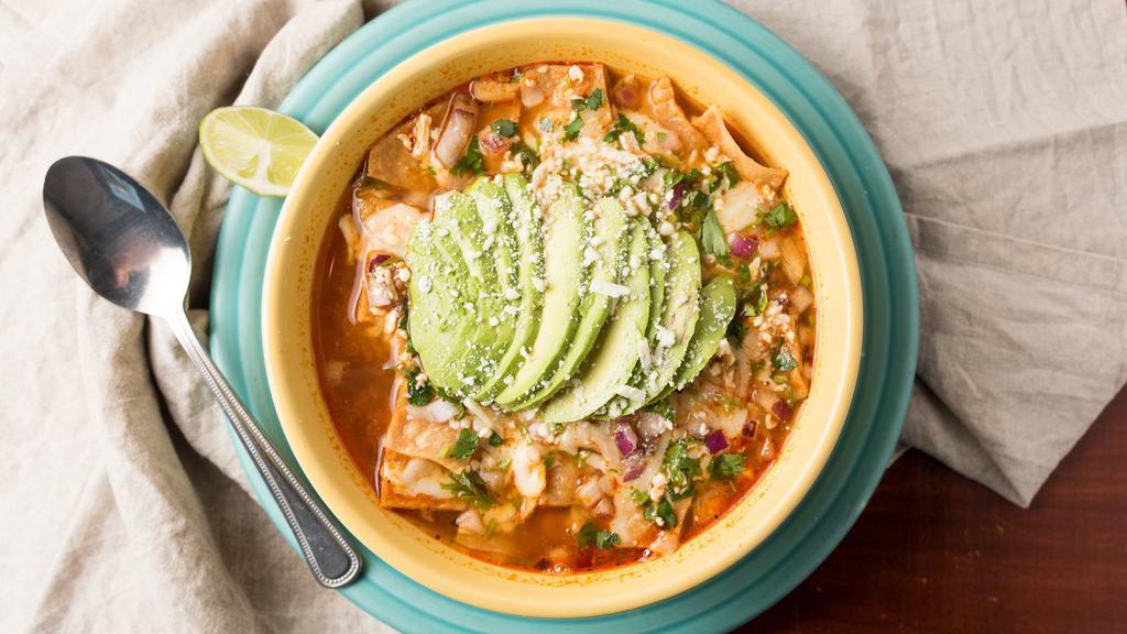 Sopa Tapatia/Tortilla Soup · Tender chicken and vegetables in a savory broth with crispy tortilla chips, avocado, jack & cotija cheese.