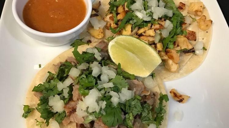 Street Taco (2 Tacos) · Topped with onions, cilantro and salsa on the side. With hot or mild salsa.
