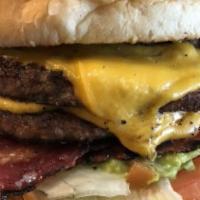 Lone Star Burger · Our famous lone star burger comes with bacon, American cheese and BBQ sauce, served on a Fre...