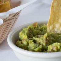Guacamole · Our creamy and seasoned guacamole is made fresh daily in our kitchen. It comes served with o...
