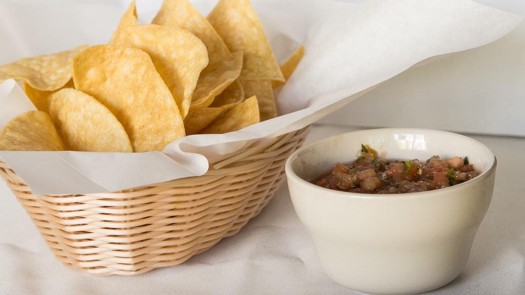 Chips & Salsa · Enjoy our crispy, fresh chips and salsa.