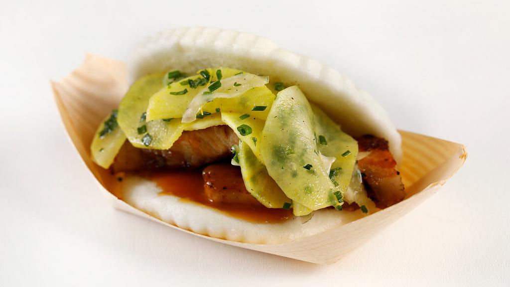 Steamed Tender Pork Belly · With miso glaze, pickled daikon and green shiso.