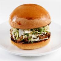 Baked Coca-Cola Braised Pork · With garlic aioli, mustard seeds and cabbage.