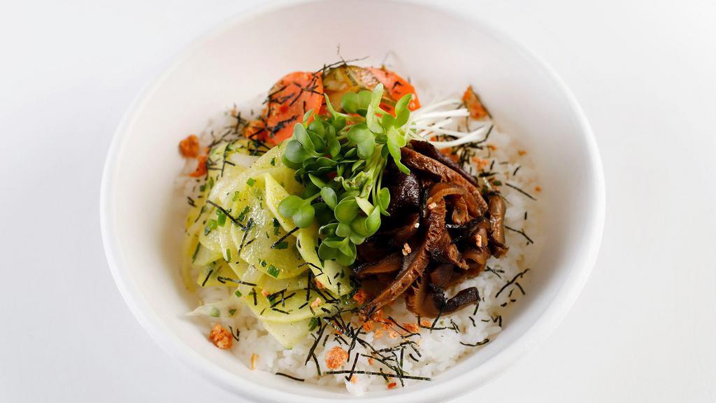 Rice Bowls · With pickled daikon, marinated mushrooms, spicy cucumbers, furikake and daikon sprouts.