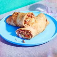 Tandoori Chicken Roll · With sliced onions and your choice of chutney in a roti roll.