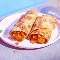 Vegetable Curry Roti Roll · With sliced onions and your choice of chutney in a roti roll.