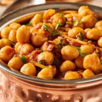 Chana Masala · Chickpeas cooked with tomato and spices.