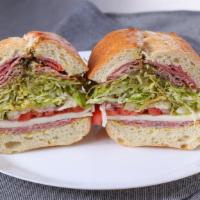 Goodfellas · Prosciutto, mild coppa, salami, provolone, and pesto. All sandwiches come with lettuce, toma...