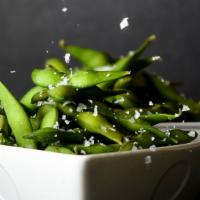 Edamame · Vegan. Steamed soy beans with sea salt.
