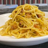 Spaghetti Alla Carbonara · spaghetti, crispy guanciale, egg, pecorino, black pepper