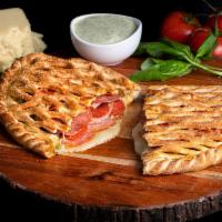 Little Italy · Signature crust, pesto garlic sauce, mozzarella, garlic Parmesan seasoning, pepperoni, salam...