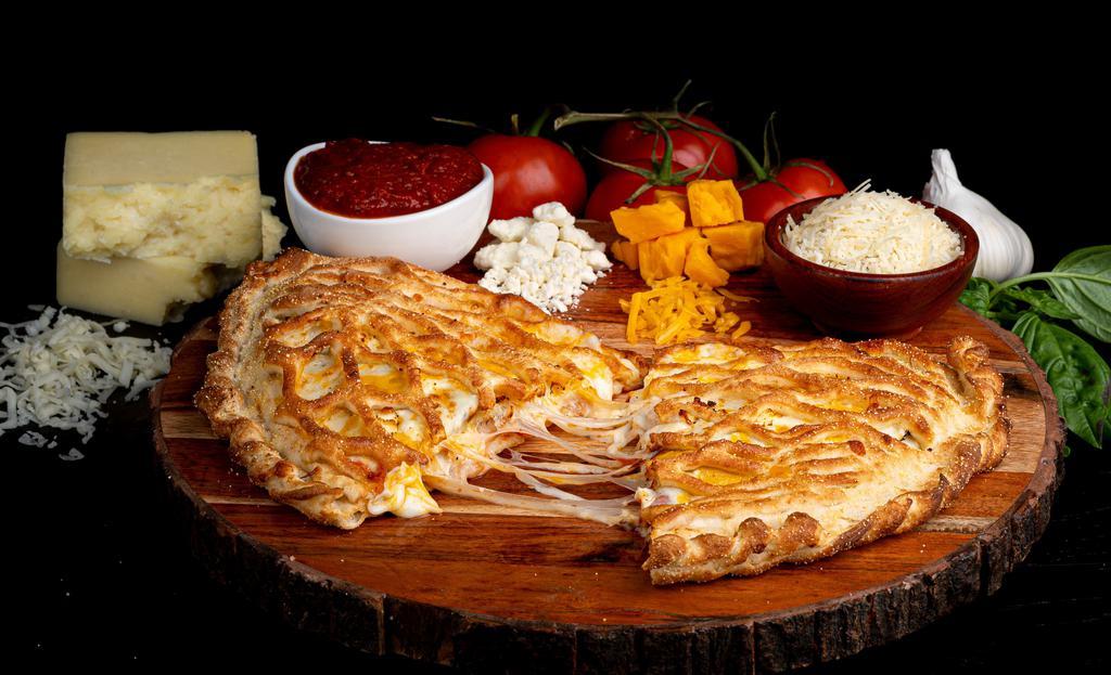 Napa · Signature Crust, Red Tomato Sauce, Mozzarella, Cheddar, Parmesan, Italian 3 Cheese, Feta Cheese, and Garlic Parmesan Seasoning.