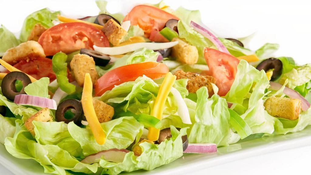 Garden Salad · Iceberg lettuce, bell peppers, red onions, black olives, fresh Roma tomatoes, mozzarella cheese, Cheddar cheese, seasoned croutons, and your choice of dressing.