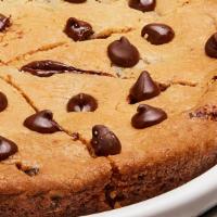 Giant Gooey Cookie · 8-inch baked chocolate chip cookie.
