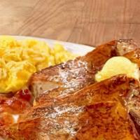 French Toast  Combo · Two eggs any style, choice of meat, potatoes and french toast topped with powdered sugar.