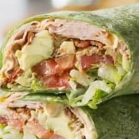 Turkey, Bacon & Avocado Wrap · Crispy romaine, shredded jack and cheddar cheese, cucumbers, tomatoes, red bell peppers, oni...