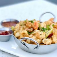 Salt & Pepper Calamari · tubes, tentacles, bell pepper and jalapeno - battered and fried with sides of sweet chili sa...