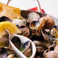Steamed West Coast Clams 
 · 14 oz steamed clams with white wine, butter, fresh garlic; served with garlic bread