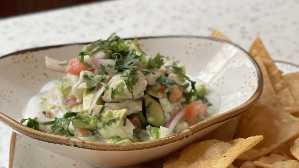 Rockfish Ceviche · lime, coconut milk, red onion, tomato, serrano, avocado, tortilla chips.

Served raw or undercooked. May contain raw or undercooked ingredients. Consuming raw, undercooked meats, poultry, seafood, shellfish or eggs may increase your risk of foodborne illness.