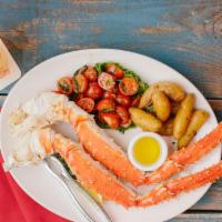 Wild Bering Sea King Crab Legs · one lb; served with drawn butter and choice of sides